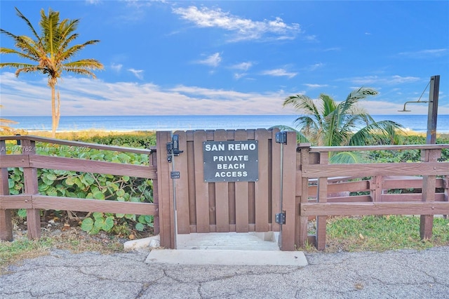 view of gate featuring a water view