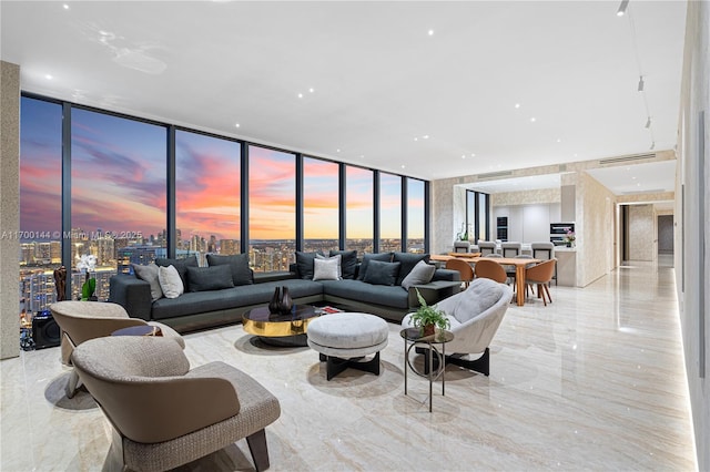 living room with expansive windows and a wealth of natural light