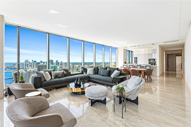 living room with floor to ceiling windows