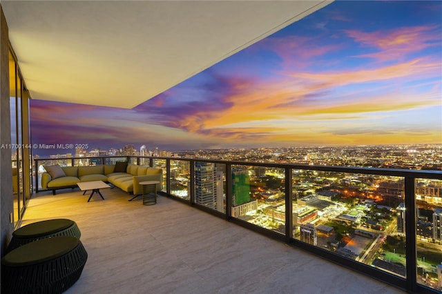 balcony at dusk with an outdoor living space