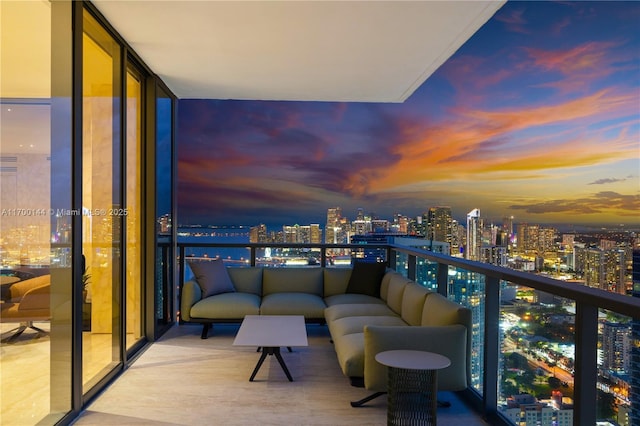 view of balcony at dusk