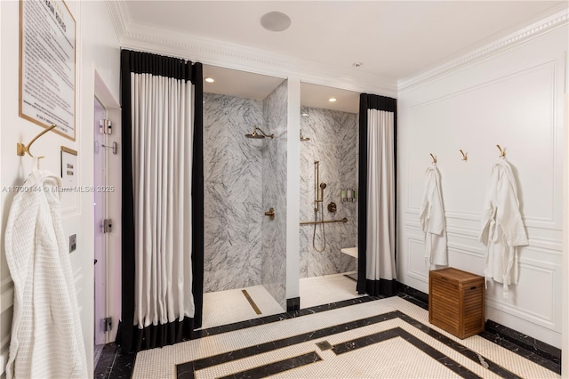 bathroom with tiled shower and ornamental molding