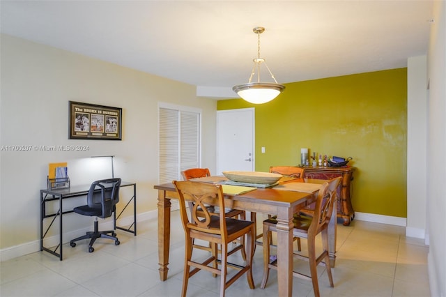 view of tiled dining space