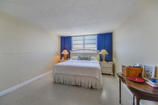 bedroom featuring a textured ceiling