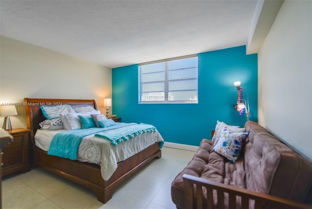 bedroom featuring a textured ceiling