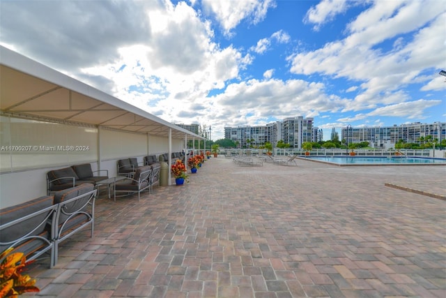 view of patio with a community pool