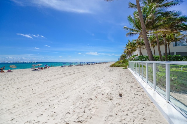 property view of water featuring a beach view