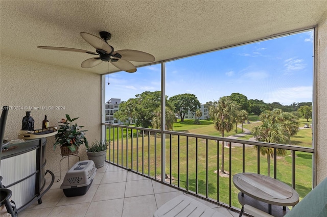 balcony featuring ceiling fan