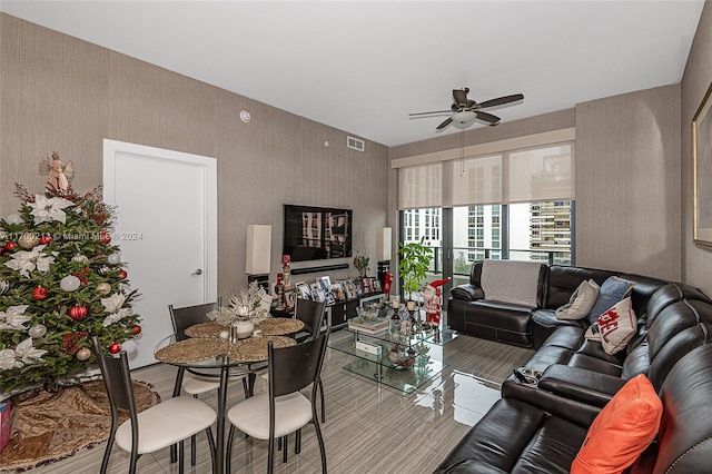 living room featuring ceiling fan