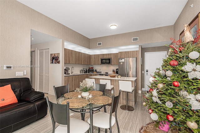 dining space with sink