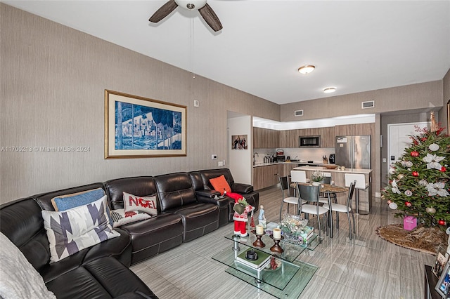 living room featuring ceiling fan