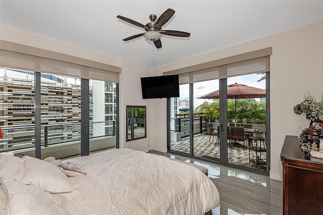 bedroom featuring access to exterior, ceiling fan, and tile patterned flooring