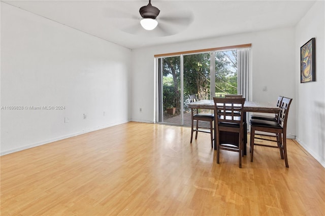 dining area featuring light hardwood / wood-style floors and ceiling fan