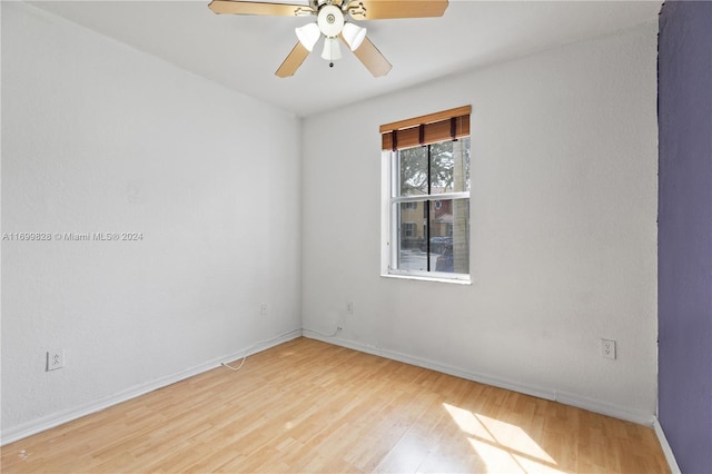 spare room with ceiling fan and light hardwood / wood-style floors