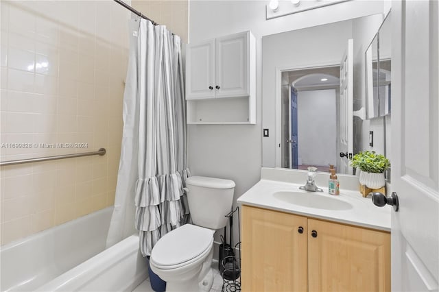 full bathroom with tile patterned floors, vanity, toilet, and shower / tub combo