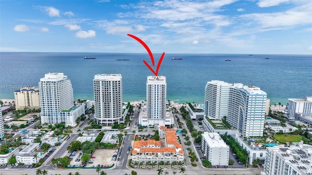 birds eye view of property featuring a water view