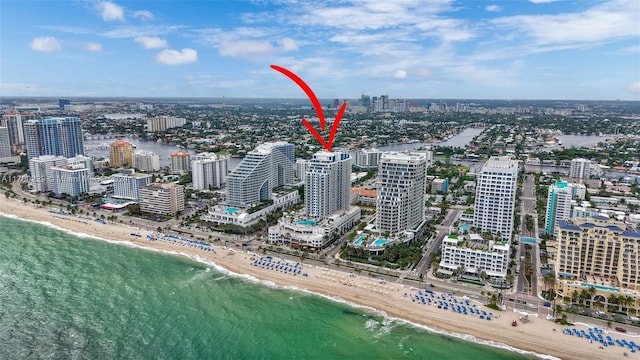 aerial view with a beach view and a water view