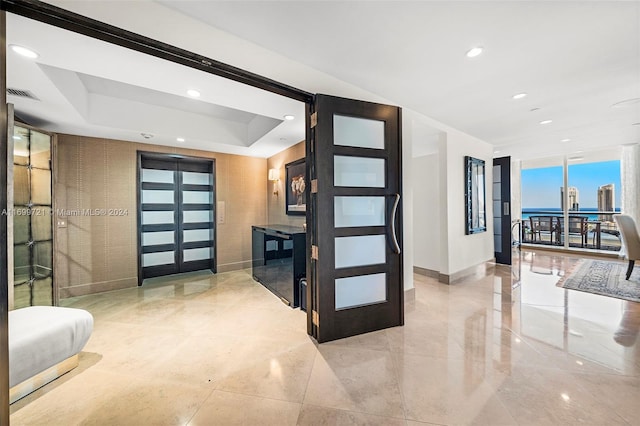 interior space featuring a tray ceiling