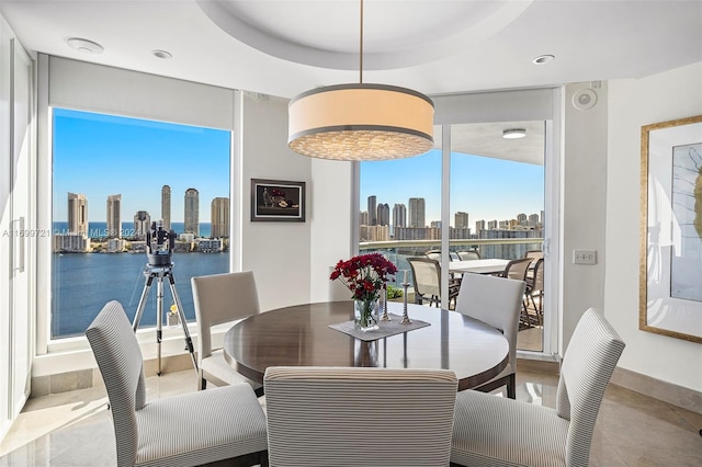 dining space with a water view