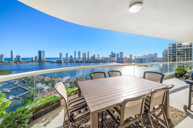 balcony featuring a water view