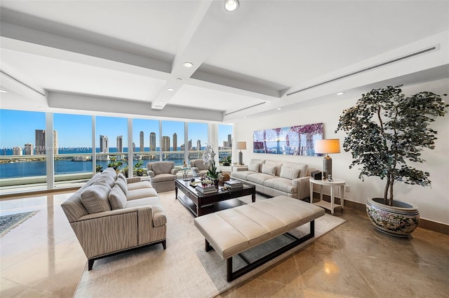 living room with beam ceiling and a water view