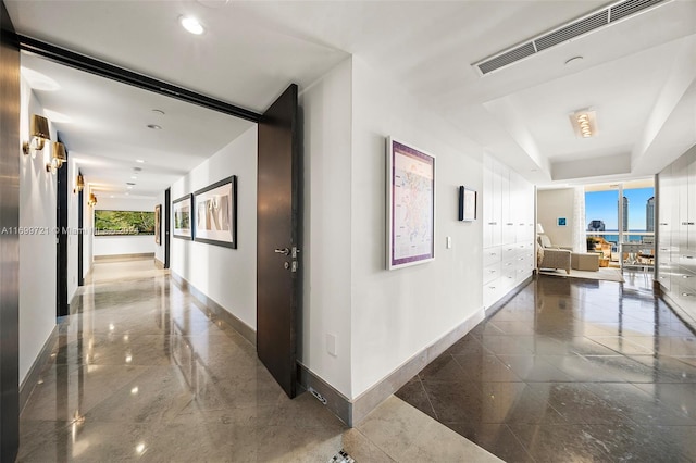 hallway featuring a wealth of natural light