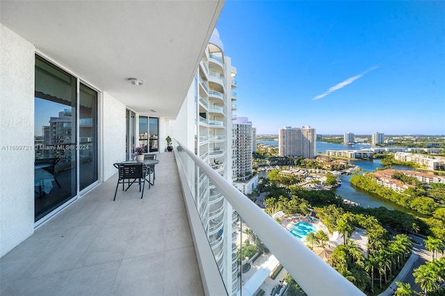 balcony featuring a water view