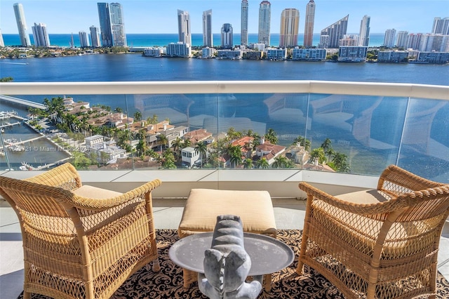 balcony featuring a water view