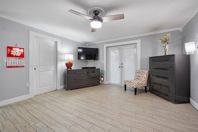 living area featuring french doors, light hardwood / wood-style floors, ceiling fan, and crown molding