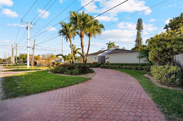 surrounding community featuring a yard