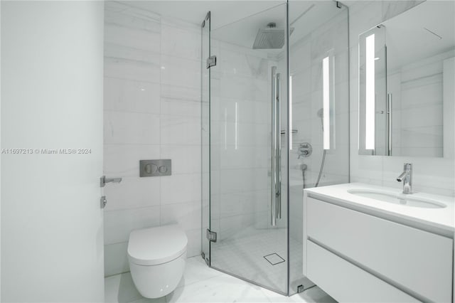 bathroom featuring vanity, toilet, tile walls, and a shower with shower door