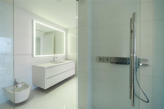 bathroom featuring vanity, tile walls, a bidet, and an enclosed shower