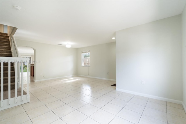 view of tiled spare room