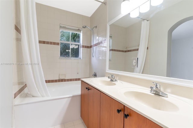 bathroom with tile patterned floors, vanity, and shower / bath combo