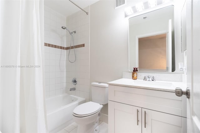 full bathroom with shower / bath combo with shower curtain, tile patterned flooring, vanity, and toilet