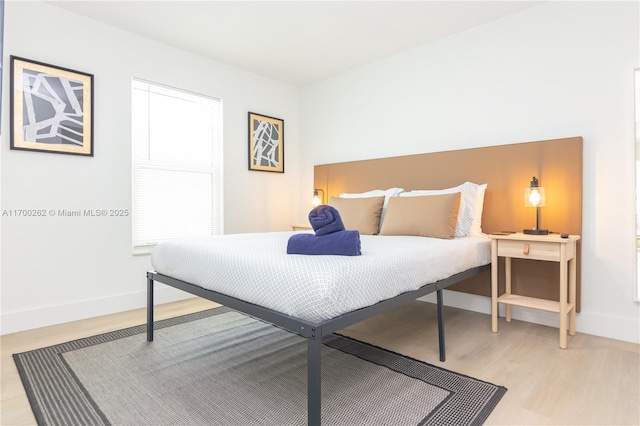 bedroom featuring light hardwood / wood-style floors