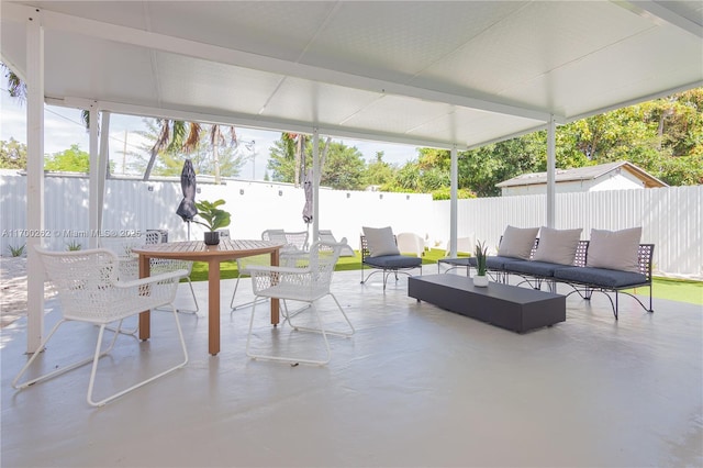 sunroom / solarium featuring a healthy amount of sunlight