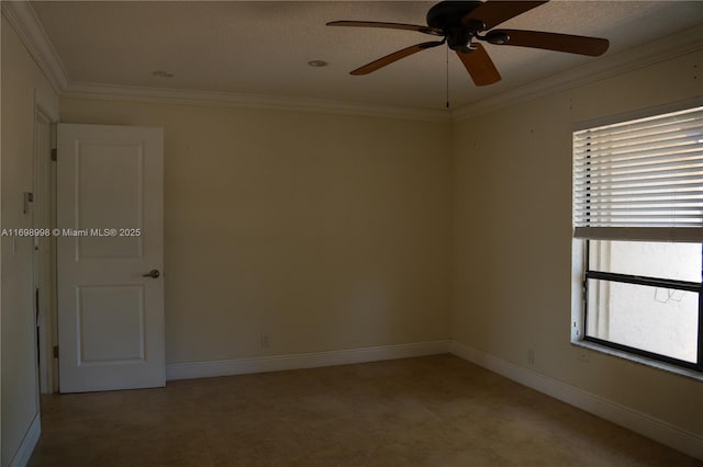 unfurnished room featuring baseboards, light floors, and crown molding