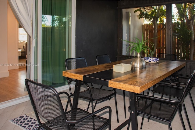 dining area with light wood-type flooring