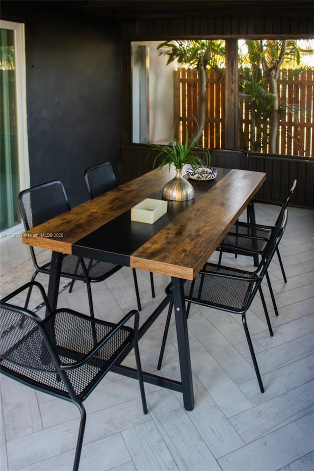 view of patio / terrace with outdoor dining area and fence