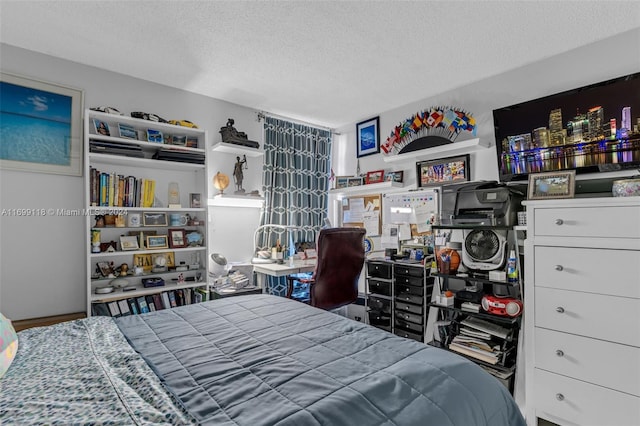 bedroom featuring a textured ceiling