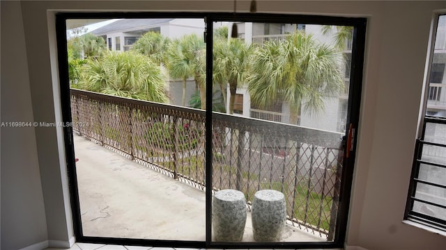 doorway to outside featuring a wealth of natural light