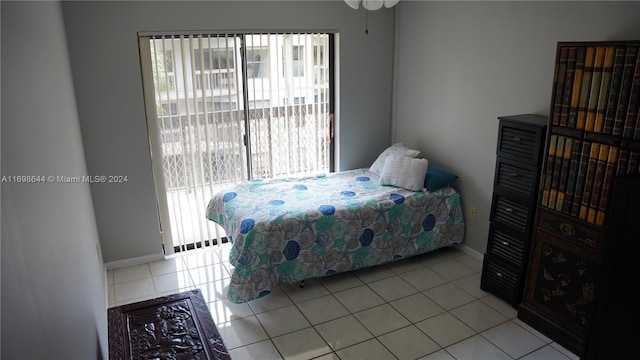 bedroom featuring light tile patterned floors