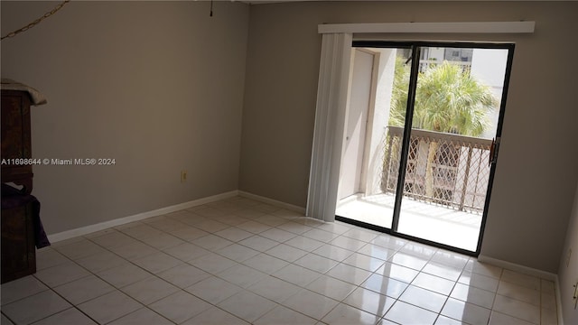 empty room with light tile patterned floors