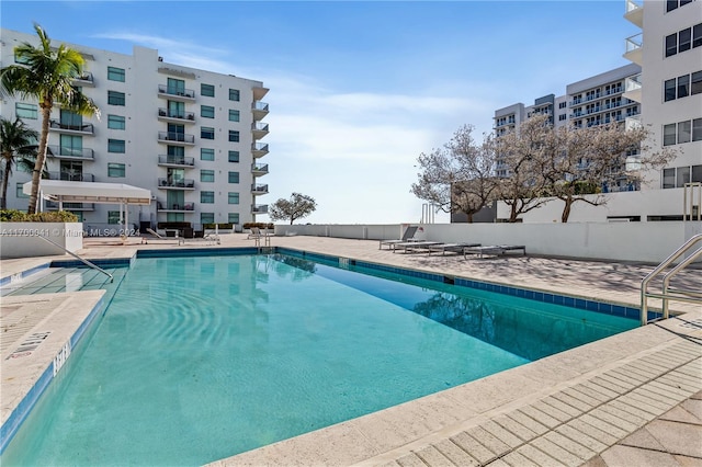 view of swimming pool featuring a patio