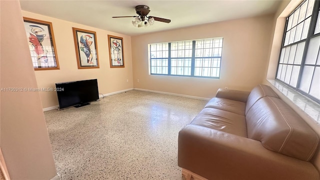 living room featuring ceiling fan