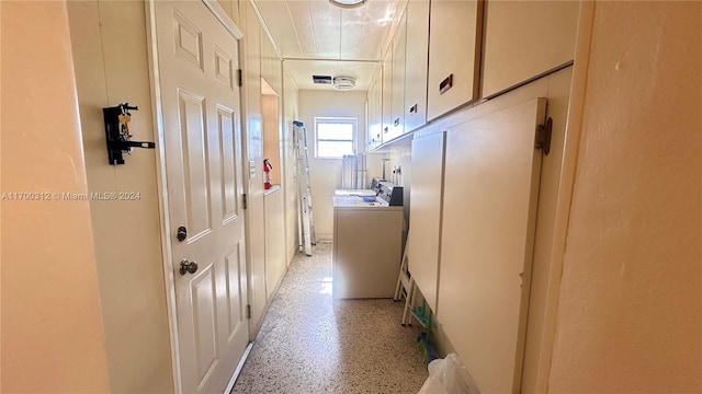 hall featuring washer / clothes dryer