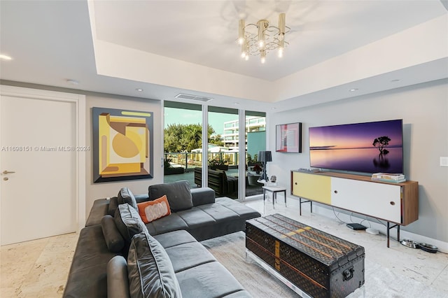 living room with an inviting chandelier