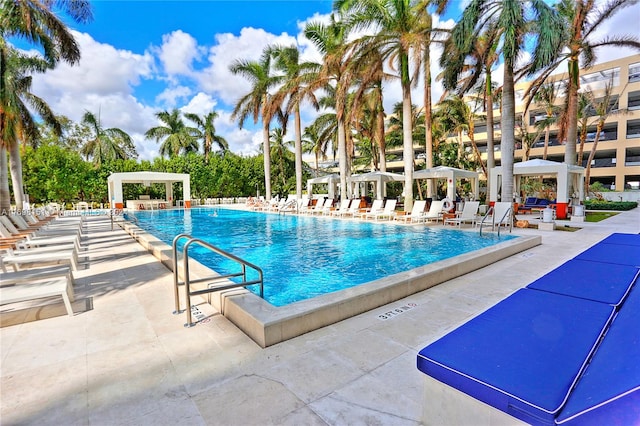 view of swimming pool featuring a patio