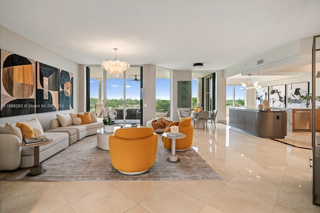 tiled living room with an inviting chandelier and floor to ceiling windows